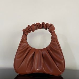 JW PEI Vegan Leather Handbag with a Scrunch Handle.